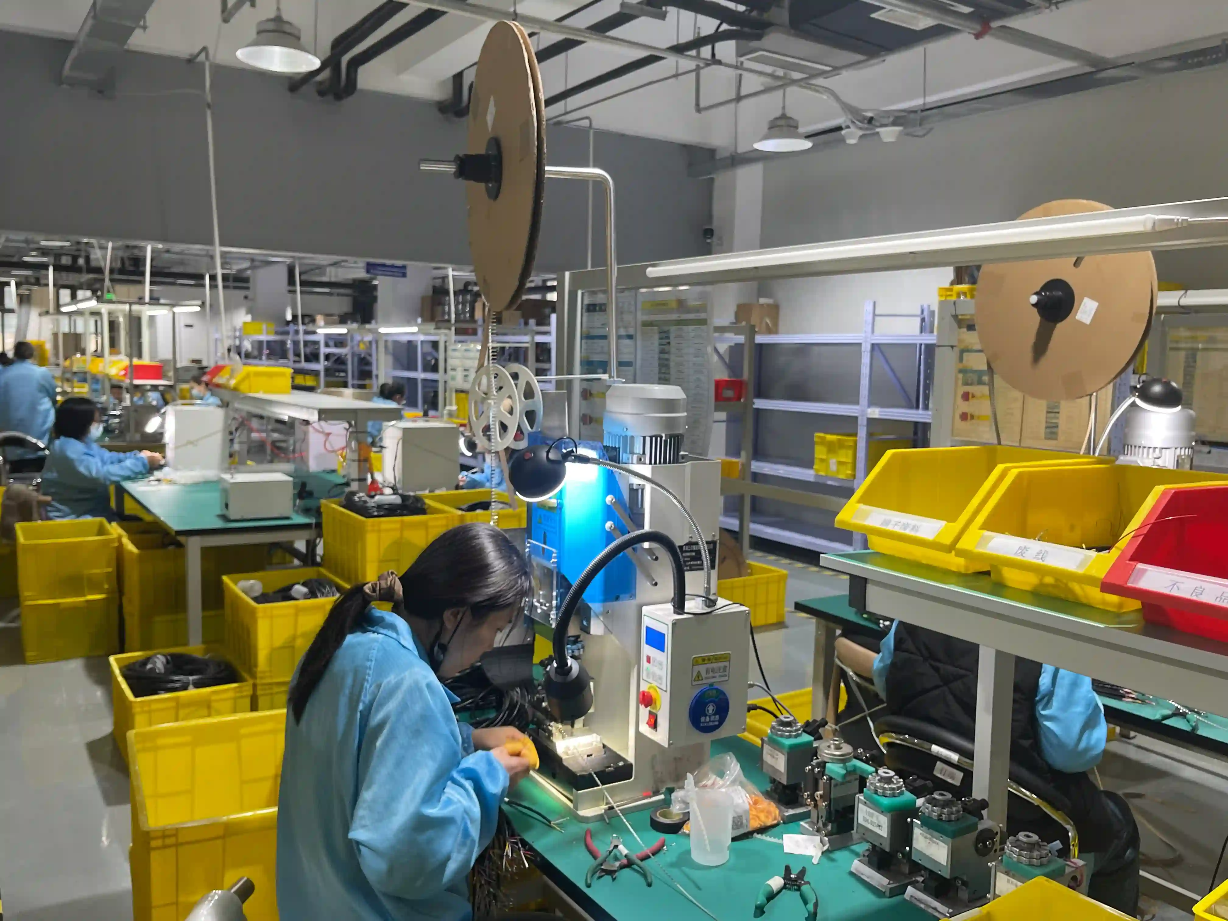 Automated terminal crimping machine producing portable cord assemblies with factory jacket stamp
