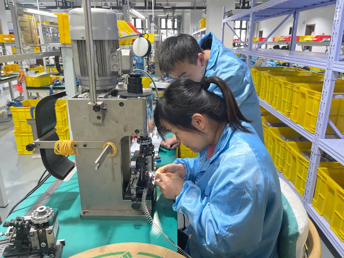 Rail-grade wire harness manufacturing with LSZH fire-safe materials